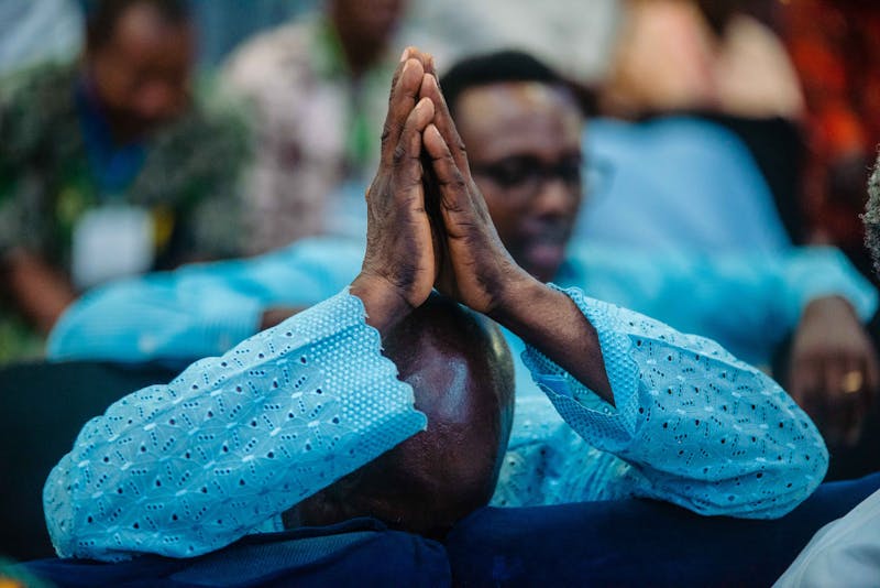 Man praying in church - devotion
